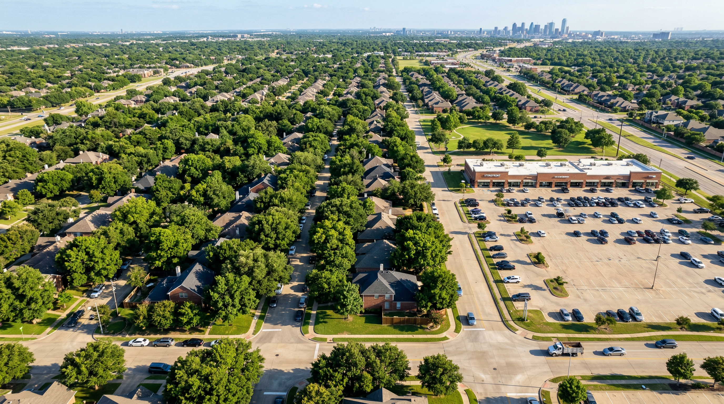 Aerial view of North Texas showing tree-covered neighborhoods alongside areas ready for new planting